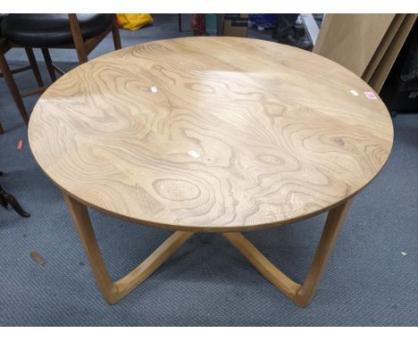 An Ercol Wychwood design circular elm coffee table on square legs united on shaped stretchers 49.5cm h x 83cm dia. Location:I