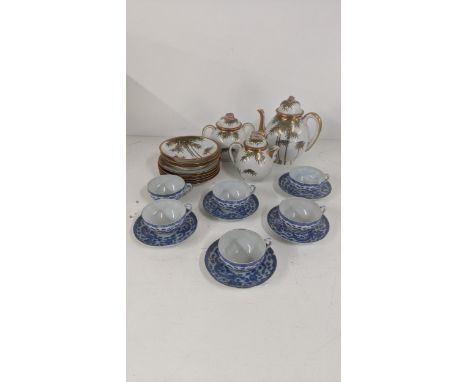 A 20th century Japanese part tea service with a set of 5 blue and white cups and saucers, and others Location:If there is no 