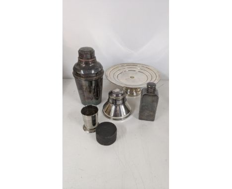 Silver plated items to include a cocktail shaker, a hip flask, and others Location:If there is no condition report shown, ple