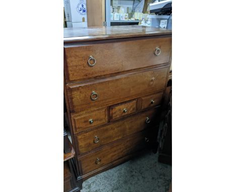 A Stagg mahogany chest of drawers, two long above three short and two further long drawers, on bracket feet, 112x82x46.5cm, w
