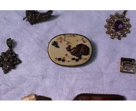 A Japanese Shibayama brooch with a chicken chasing a fly, together with a banded agate bar brooch, an amethyst and seed pearl