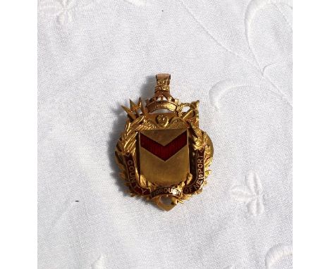 A 9ct yellow gold pendant bearing the enamel Coat of arms of the County Borough of Newport, issued to "Mrs Alfred E Pugh, May