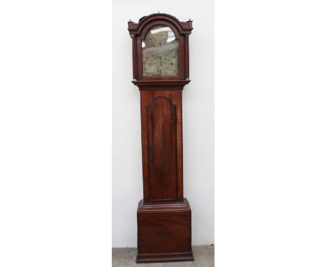 A 19th century mahogany longcase clock, the domed hood with fluted columns above a long arched trunk door, box base and plint