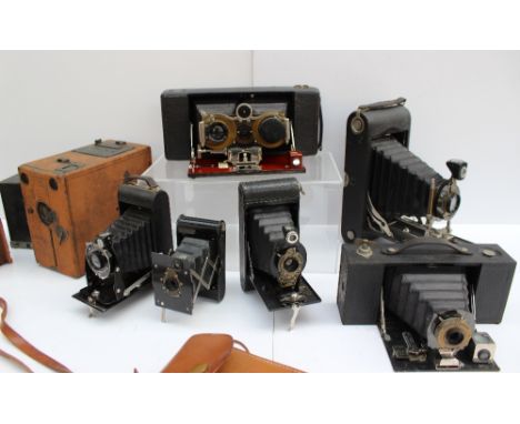 A Blair camera co. stereo Hawkeye model 6 camera in a leather covered case together with assorted Kodak and other  cameras an