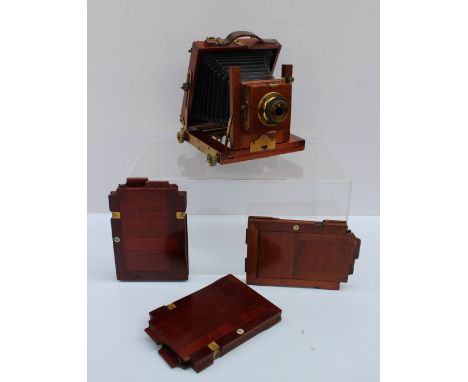 A W. Tylar of Birmingham plate camera, "The Barnardo", with a brass lens and paper bellows, 18cm high x 14cm wide