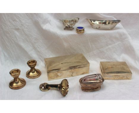 A late Victorian silver cigarette box of cushion rectangular shape, Birmingham, 1892, together with a smaller cigarette box, 