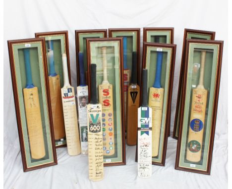 A Stuart Surridge cased autographed Cricket bat, signed by K C Wessels, W J Cronje,
D J Cullinan etc together with eight othe