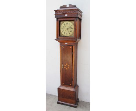 A 19th century oak longcase clock, the hood with a domed top and half section columns above a long trunk door and box base an