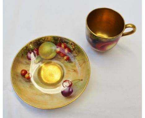 A Royal Worcester cabinet coffee can and saucer, the can painted with peaches and black grapes in a naturalistic setting sign