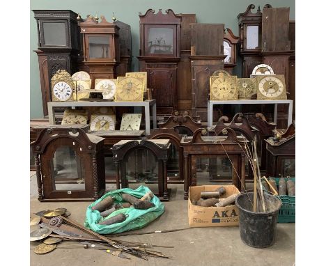 LARGE GROUP OF ANTIQUE CLOCKS / CLOCK PARTS workshop contents including 13 trunks, some with hoods, 14 hoods, 14 dials/moveme