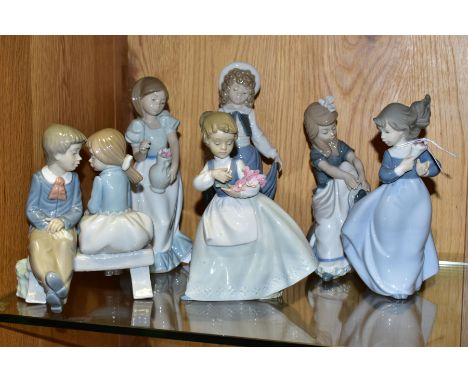 SIX NAO FIGURES, comprising boxed Windy Afternoon No1089, boxed My Bouquet No495 (missing flower), First Love No1136, Tying m