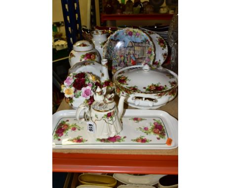 A GROUP OF ROYAL ALBERT OLD COUNTRY ROSES GIFTWARES AND DINNERWARES, comprising a small novelty teapot, a tureen (handle brok