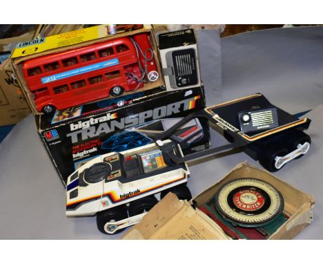 A BOX OF TOYS, comprising an MB Electronics Bigtrak and a boxed Bigtrak Transport accessory dump unit, a boxed Lincoln Intern