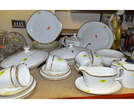 A FORTY FOUR PIECE ROYAL DOULTON GOLD CONCORD SERVICE, comprises jug, lidded sugar bowl, gravy dish with stand, six dinnerpla