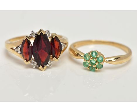 TWO 9CT GOLD GEM SET RINGS, the first designed with three graduating marquise cut garnets, single cut diamond accents, single
