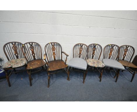 A SET OF SEVEN ELM AND BEECH HOOP BACK CHAIRS, including one carver condition:-fluid staining to chairs, and an oak gate leg 