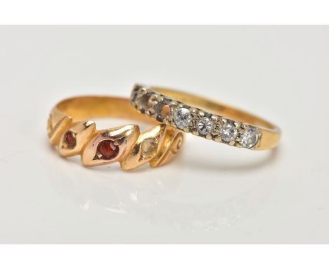 AN 18CT GOLD RING AND A DIAMOND HALF ETERNITY RING, the first a late Victorian ring, designed with three asymmetrical marquis