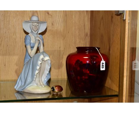 A ROYAL DOULTON FLAMBE VASE, A NAO FIGURINE AND AN ENAMEL TRINKET BOX, comprising Royal Doulton flambe vase printed with a ru