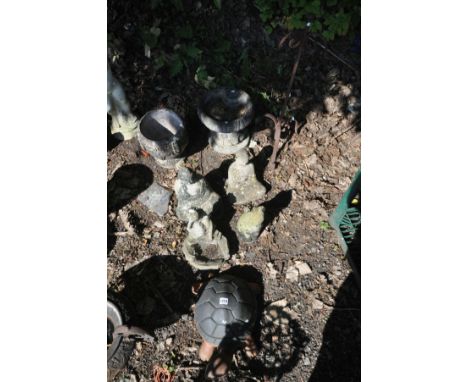 A SMALL SELECTION OF COMPOSITE GARDEN ITEMS, to include a bird bath, small planter, two buddha figures, etc, along with a met