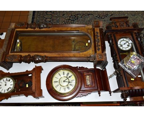 SIX LATE 19TH AND 20TH CENTURY WALL CLOCKS AND CASES, including a late 19th century walnut and stained Vienna regulator, with