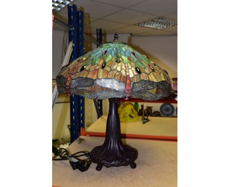 A LARGE MODERN TIFFANY STYLE LAMP, with a green, red and brown glass shade decorated with dragonflies and glass cabochons, ov