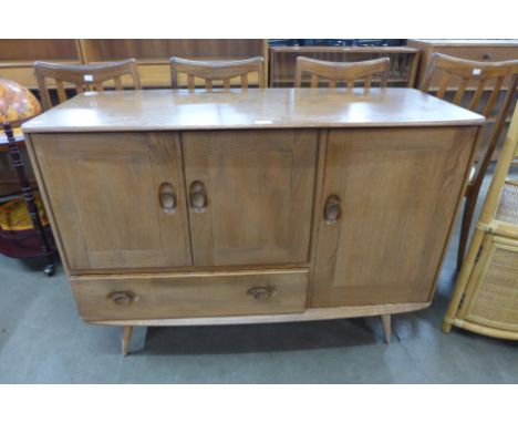 An Ercol Blonde elm sideboard 