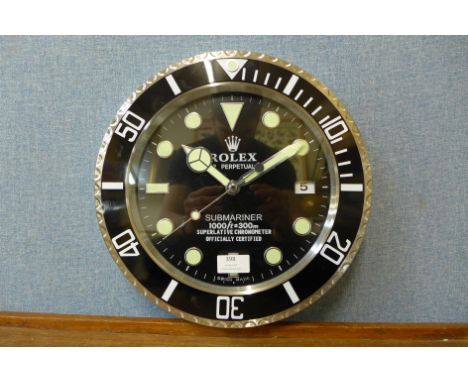 A Rolex style dealer's wall clock 