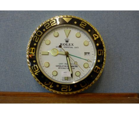 A Rolex style dealer's wall clock 