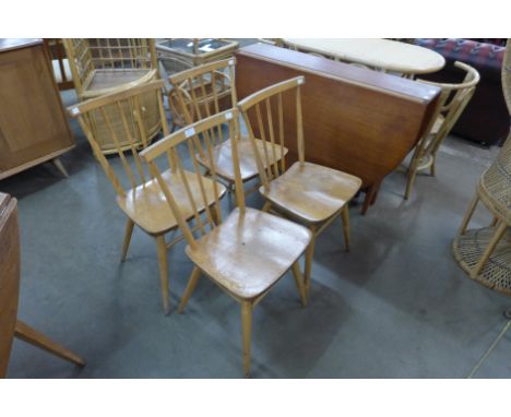 A set of four Ercol Windsor Blonde model 391 dining chairs 