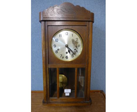An oak wall clock 