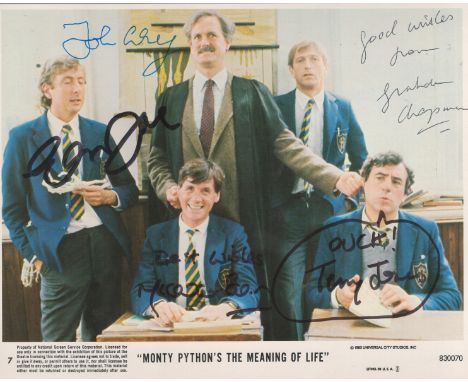 Monty Pythons The Meaning of Life, a 10x8 film photo. Signed by the five stars: Graham Chapman, John Cleese, Michael Palin, E