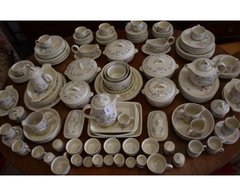 An extensive Poole Springtime pattern dinner and tea set, including tureens and covers, cruet set, butter dish, vegetable dis