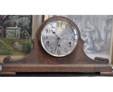 An early 20th century oak mantel clock, three-train Westminster chime movement by Kienzle, c.1930