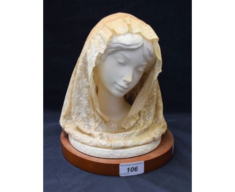 A Lladro ceramic bust, Lace Veiled Lady, wooden plinth, 22cm over base