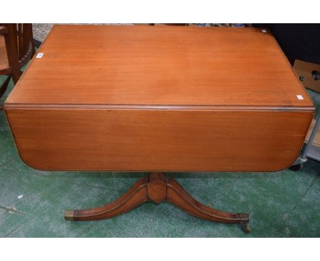 A 19th century mahogany sofa table, rounded rectangular top with fall leaves above a pair of frieze drawers, sabre legs, bras