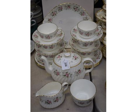 A Minton Spring Bouquet pattern tea set, for six, comprising cups, saucers, side plates, tea pot, milk jug, sugar bowl and ca