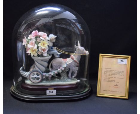 A Lladro ceramic figure group, Carrito de Fantasia, limited edition 589/5000, certificate, glass dome and plinth