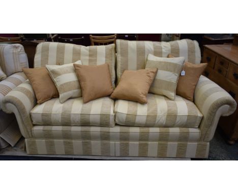 A contemporary scroll arm sofa, labelled Peter Guild, 205cm wide