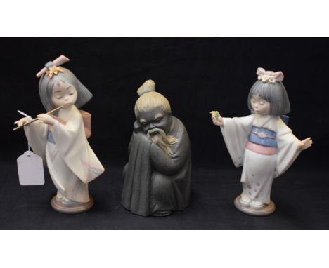 A Lladro ceramic figure, Flower Gazer, 6152; others, Playing The Flute, Chinese Man (3)