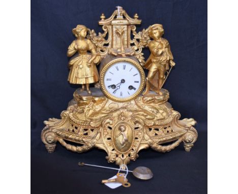 A Louis XVI Revival mantel clock, the 7.5cm dial with Roman numerals flanked by young farmhands resting by a fountain upon a 