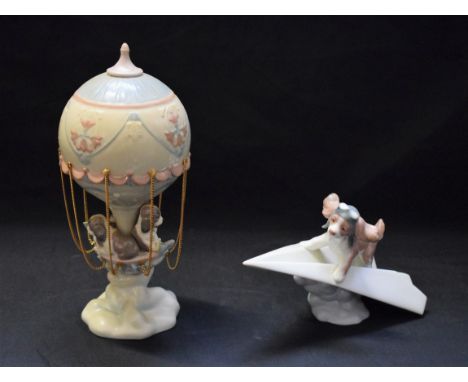 A Lladro ceramic model of puppies in hot air balloon, Up and Away, 06524, boxed; another, Let's Fly Away, boxed (2)