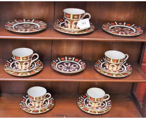 A Royal Crown Derby 1128 pattern part tea set, comprising cups, saucers and side plates, all first quality