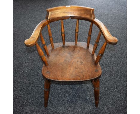 A 19th century smoker's bow armchair, c.1880