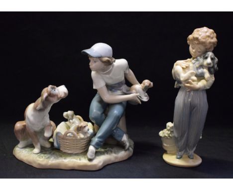 A Lladro ceramic figure, This One's Mine, 5376; another, My Buddy (2)