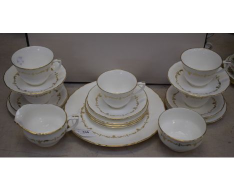 A Royal Worcester Gold Chantilly pattern part tea service, for five, comprising cups, saucers, side plates, milk jug, sugar b