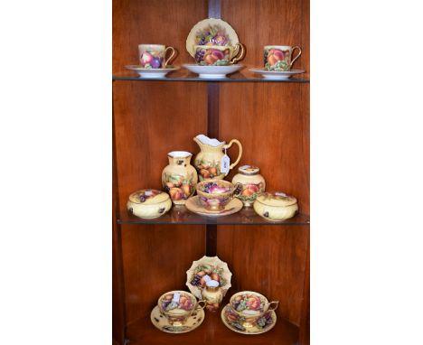 An Aynsley Orchard Gold pattern part tea service, including four tea cups and saucers, two coffee cans and saucers, milk jug,