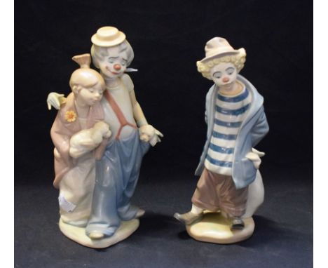 A Lladro ceramic figure group, Pals Forever, 07686, boxed; another, Little Traveller (2)