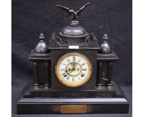 An early 20th century Architectural black Ashford marble mantel clock, eagle finial, American manual movement, c.1910