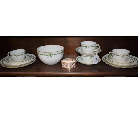 A Royal Crown Derby tea set, for four, comprising cups, saucers, side plates and slop bowl; a Royal Crown Derby Honeysuckle p