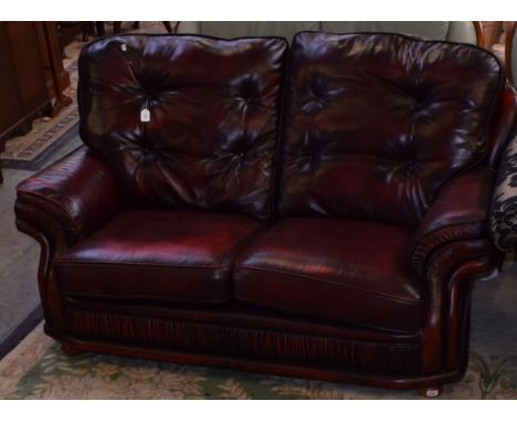 A 20th century oxblood leather sofa, 171cm wide